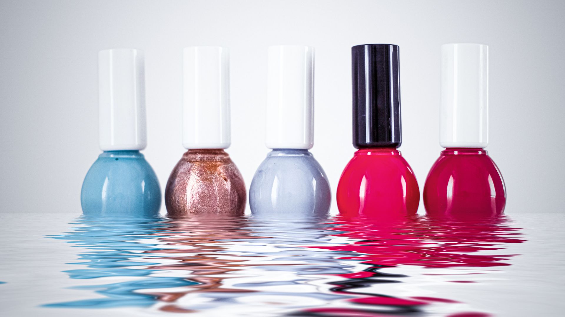 Smalti azzurro, bronzo, lilla e rosso