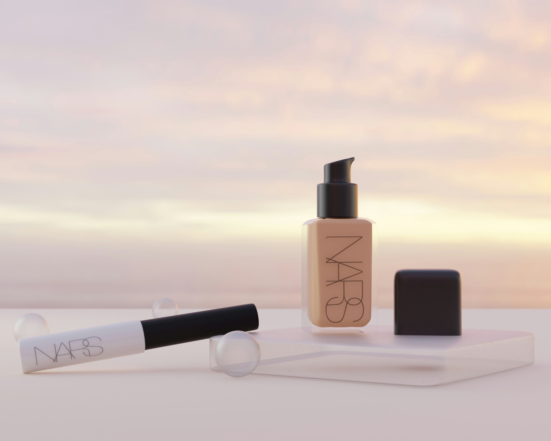 Fondotinta e make-up viso — prodotti NARS su sfondo pastello